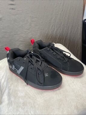 DC Men’s Black Skate Sneakers with Red Soles and Pull Tabs